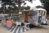Photo of Large 1947 Spartan Manor Travel Trailer, Side Awning and Party Decorations